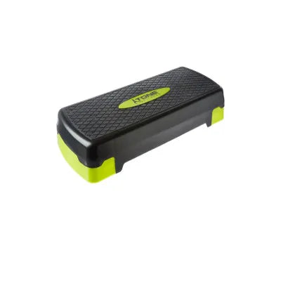 Tone Fitness aerobic step platform on a hardwood floor, ideal for home workouts and cardio training in 2025 with a compact and sturdy design.